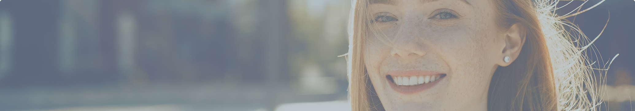 Young blonde woman smiling after cosmetic dentistry in Tewksbury