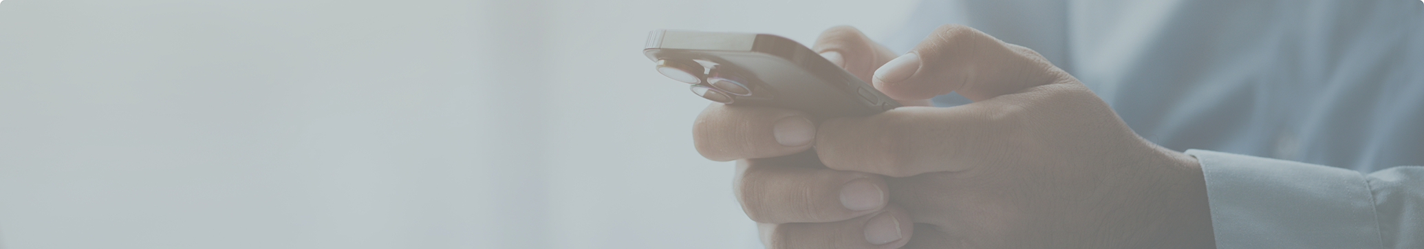 Person typing on their phone