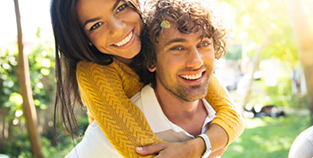 Young couple embracing in the sun
