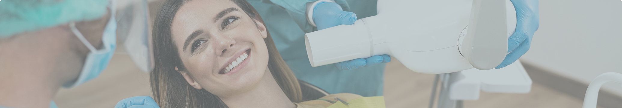 Young woman smiling at her dentist